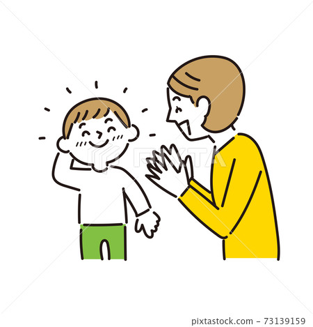 A boy who is pleased to have his mother compliment him 73139159