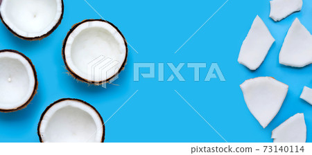 Coconuts on blue background. Top View 73140114