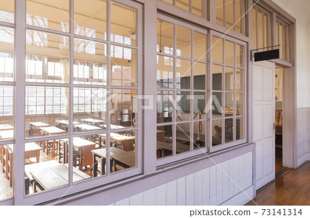 Nostalgic elementary school building classroom desk and chair school building window glass 73141314
