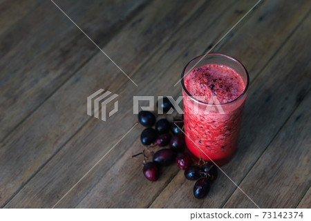 Karonda Fruit spinning with ice smoothie juice Karonda Fruit spinning with ice smoothie juice 73142374