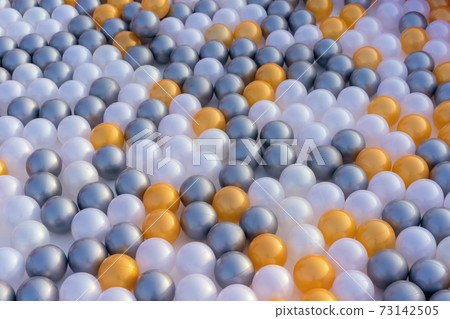 close up of plastic toy colorful ball at the playground for children close up of plastic toy colorful ball at the playground for children 73142505