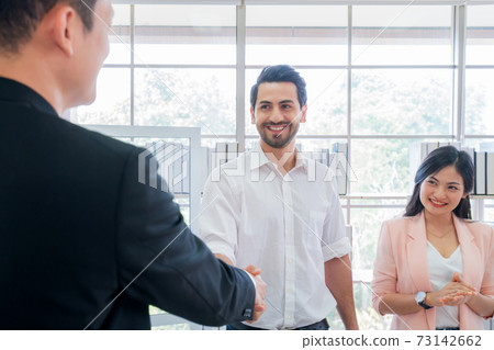 businessman and secretary with team business working together using laptop computer at modern office, Lifestyle business work at home concept businessman and secretary with team business working together using laptop computer at modern office, Lifestyle business work at home concept 73142662
