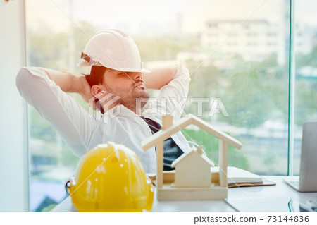 engineer tired and napping or sleeping in the office when lunch brake time after hard work overnight engineer tired and napping or sleeping in the office when lunch brake time after hard work overnight 73144836