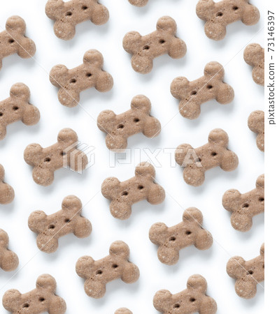Delicious of dog biscuit on the white background pattern 73146397