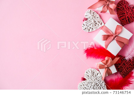 Happy valentine's day greeting card. Gift boxes and hearts. Copy space. Top view. Flat lay Happy valentine's day greeting card. Gift boxes and hearts. Copy space. Top view. Flat lay 73146754