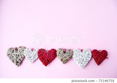 Valentine hearts on pink background with copy space. Symbols of love in shape of heart for Happy Valentine's , Women's, Mother's Day, birthday. 73146758