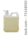 Closeup gallon bottle of Yellow soap with refill  droper pump isolated on white background 73148092