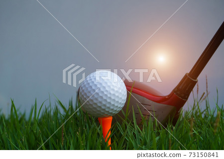 Golf balls on the golf course with golf clubs ready for golf in the first short. In the morning, with the beautiful sunlight.Sports that people around the world play in the holidays Golf balls on the golf course with golf clubs ready for golf in the first short. In the morning, with the beautiful sunlight.Sports that people around the world play in the holidays 73150841
