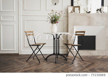 spacious living room with a classic table spacious living room with a classic table 73150869