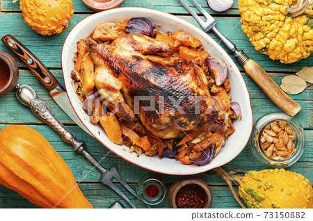 Baked partridge with pumpkin 73150882
