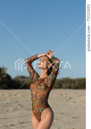 Sensual young lady on beach Sensual young lady on beach 73151955