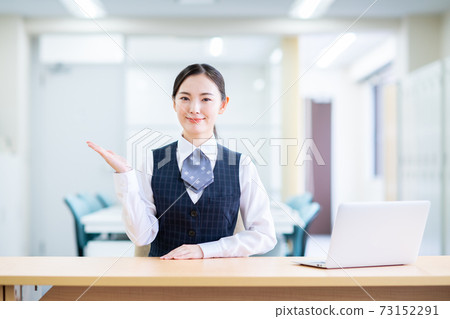 Business woman at the reception Business woman at the reception 73152291