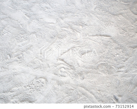 Park ground with lots of footprints Park ground with lots of footprints 73152914