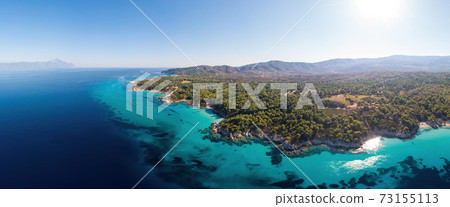 Wide shot of the Aegean sea coast in Greece 73155113