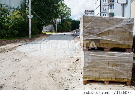stacks of paving slabs prepared for laying 73156075