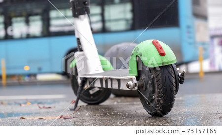 Parked electric scooter in Bucharest, Romania Parked electric scooter in Bucharest, Romania 73157165