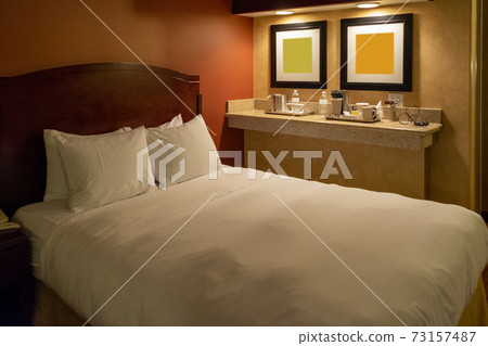 View of a comfortable hotel room . View of a comfortable hotel room . 73157487