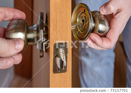 Spindle of  interior door handle mechanism enters hole in rose when installing doorknob with lock and latch. 73157701