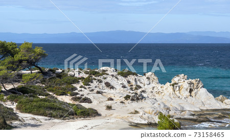 Aegean sea coast in Greece 73158465