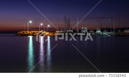 Sea port at night in Greece Sea port at night in Greece 73158543