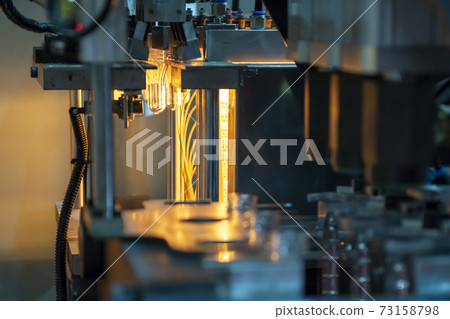 The preform shape of PET bottle in the blowing mold machine. 73158798