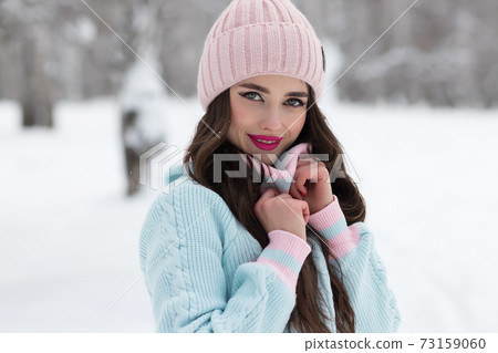 Beautiful girl in winter forest Beautiful girl in winter forest 73159060