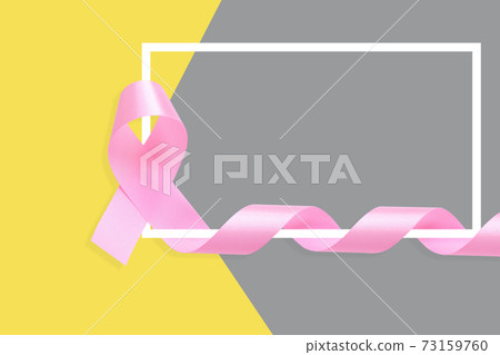 Pink ribbon on gray and yellow background. Cancer concept 73159760