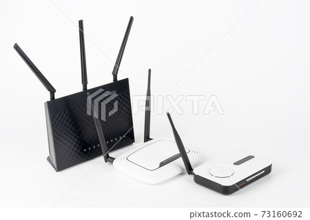 Three  Wi-Fi  routers, wireless devices with one, two and three antennas. 73160692