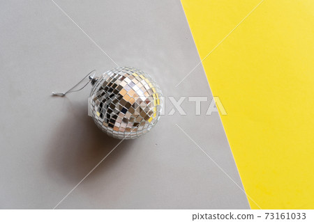 Disco balls on blue background 73161033