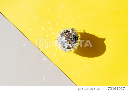 Disco balls on blue background 73161037