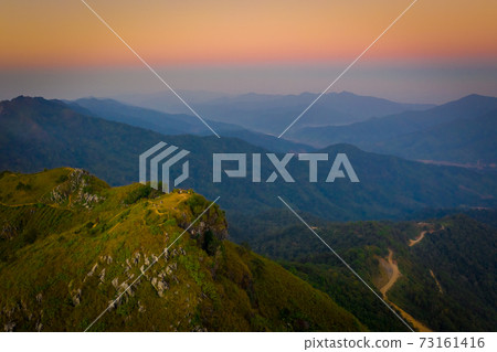 Aerial view of Doi Pha Tang the famous mountain tourist attraction in Chiang Rai province, Thailand Aerial view of Doi Pha Tang the famous mountain tourist attraction in Chiang Rai province, Thailand 73161416