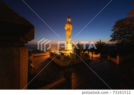 Gold Buddha statue the landmark of Nan province Thailand in Wat Phrathat Khao Noi temple Gold Buddha statue the landmark of Nan province Thailand in Wat Phrathat Khao Noi temple 73161512