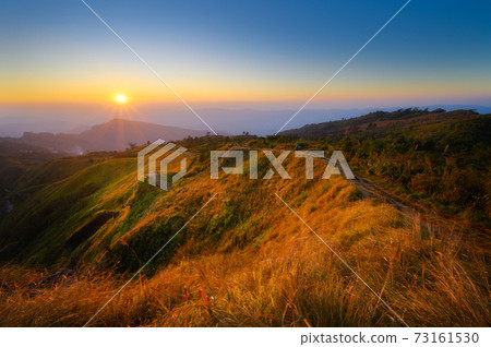 Beautiful mountain landscape at sunsest at Phu Chi fa or Phu Chee fah Beautiful mountain landscape at sunsest at Phu Chi fa or Phu Chee fah 73161530