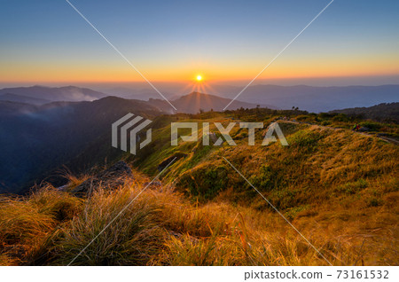 Beautiful mountain landscape at sunsest at Phu Chi fa Beautiful mountain landscape at sunsest at Phu Chi fa 73161532