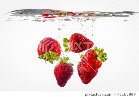 Strawberries Floating In Water 73163997