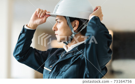Construction management man wearing a helmet "LINK FOREST" 73164756
