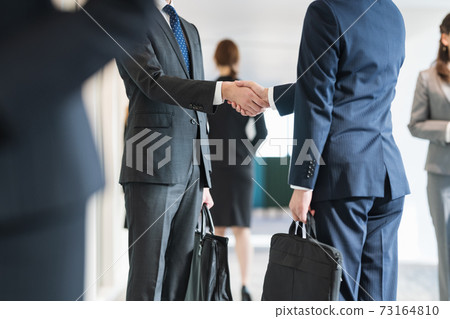 Businessmen shaking hands "LINK FOREST" Businessmen shaking hands "LINK FOREST" 73164810