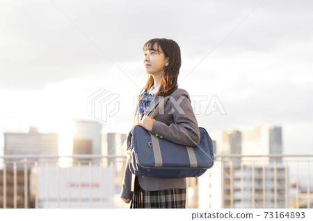 Schoolgirl in uniform Junior high school High school 73164893