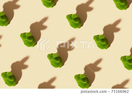 Pattern of green easter bunny. Abstract easter background. 73166962