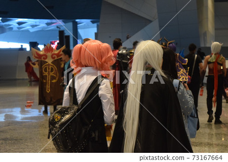 A woman enjoying cosplay at an event (Dalian, China) A woman enjoying cosplay at an event (Dalian, China) 73167664