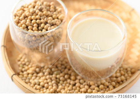 Soy milk and soy beans in a glass, Healthy drink 73168145