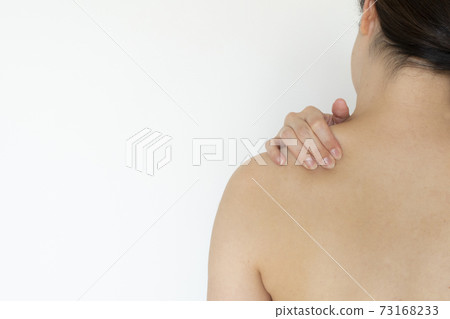 Woman with stiff shoulders white background 73168233