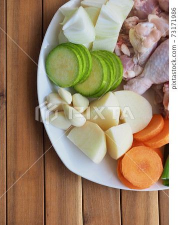 Raw chicken and vegetables, potatoes, carrots, onions, Korean food Dakbokkeumtang ingredients 73171986