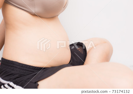 Big belly of pregnant women new born concept Big belly of pregnant women new born concept 73174132