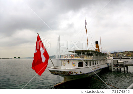 Swiss pleasure boat on the docks of Lake Geneva Swiss pleasure boat on the docks of Lake Geneva 73174845
