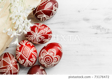 Black colored Easter eggs. Pysanka on white 73176472