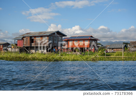 Traditional house and floating garden on Inle lake, myanmar Traditional house and floating garden on Inle lake, myanmar 73178366