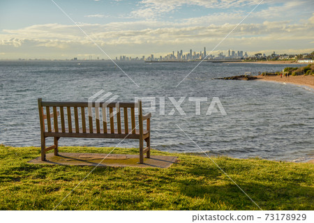 Wooden bench near Brighton beach, Melbourne Wooden bench near Brighton beach, Melbourne 73178929