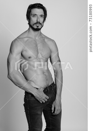 Portrait of handsome man shot in black and white Portrait of handsome man shot in black and white 73180993