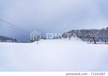Image of a ski resort with few people 73181807